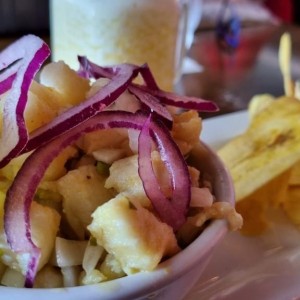 SEA BASS CEVICHE (Served with Crispy Plantain Chips , Traditional Passion Fruit & Coconut Delight)