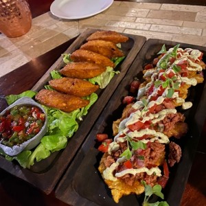 Empanada y montaditos de ropa vieja en patacon