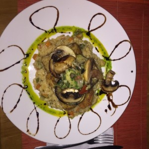 Filete de pescado sobre risotto