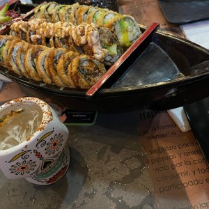 Barco de sushi y kanpai kila