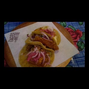 Tacos de cochinita, chorizo y corvina