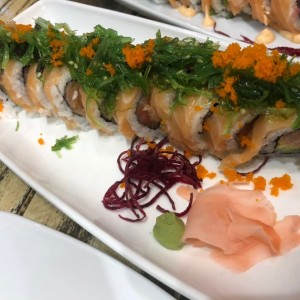 Salmon sushi with avocado and seaweed