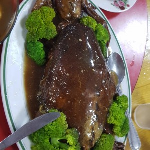 pato relleno con arroz chino