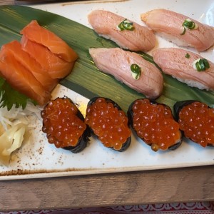 ikura, salmon flameado y sashimi de salmon