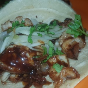 Trio de tacos de puerquito 