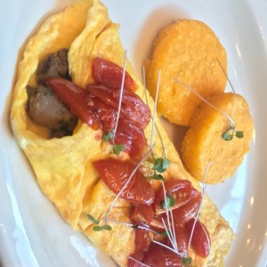 Omelette con cherry y puerco. 