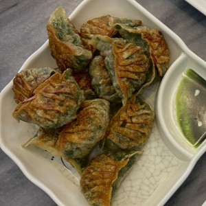 Dumpling de puerco con cebollina