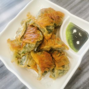 Dumpling de puerco con cebollina