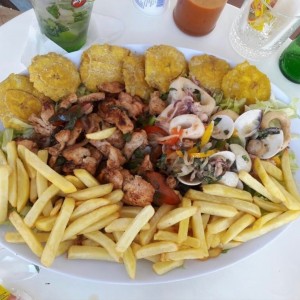 Ceviche (fresh and fried) with patacones and fries