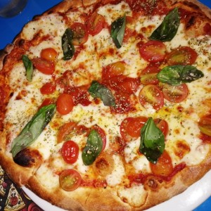 Pizza Tomate y rugula