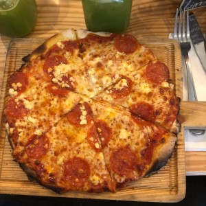 pizza de peperoni con miel