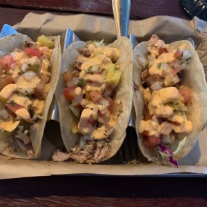 Two smoked tuna tacos and one jerk chicken taco. Excellent! 