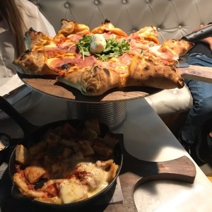 Pizza estrella y nachos