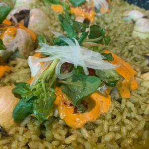 Arroz verde con mero y almejas 