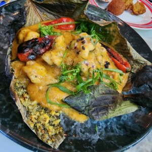 Tamal de arroz con langosta