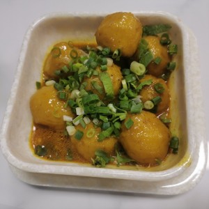 Bolita de Pescado en salsa de curry