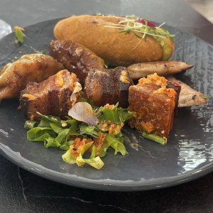 Carimañolas de Tasajo de la casa, pork belly, gyosas , chorizos 