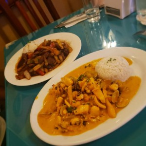 lomo saltado y pescado con mariscos