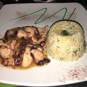 Pulpo al ajillo con arroz pencas