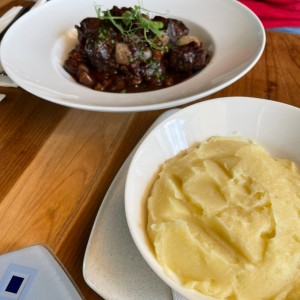 Mashed potatoes and beef stew