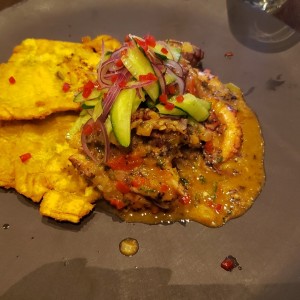Pulpo con curry y coco