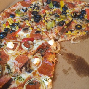 pizza delivery .. mitad rustica mitad siciliana . delishhh