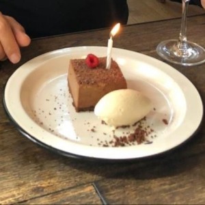 chocolate mousse birthday cake on the house